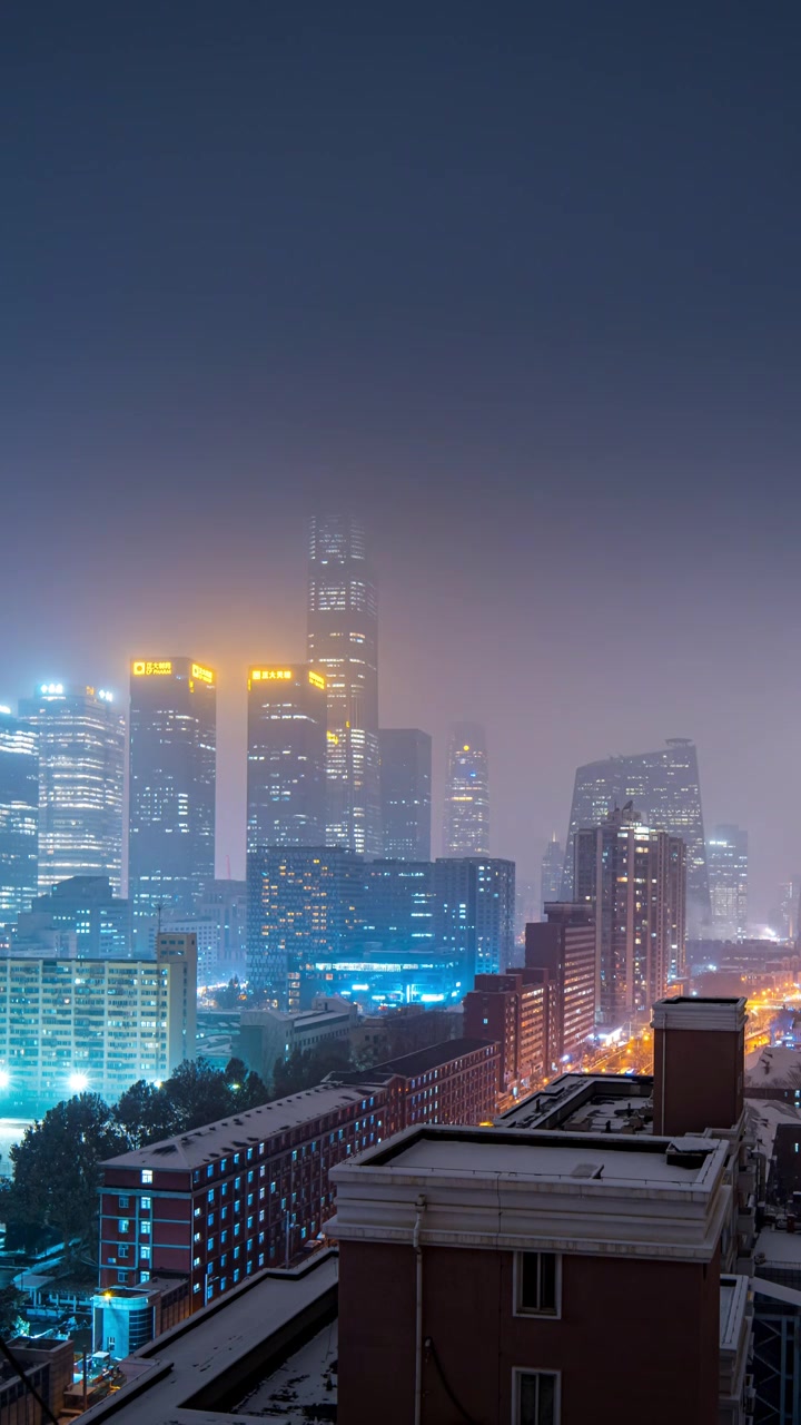 鸟瞰北京国贸CBD雪景夜晚视频素材