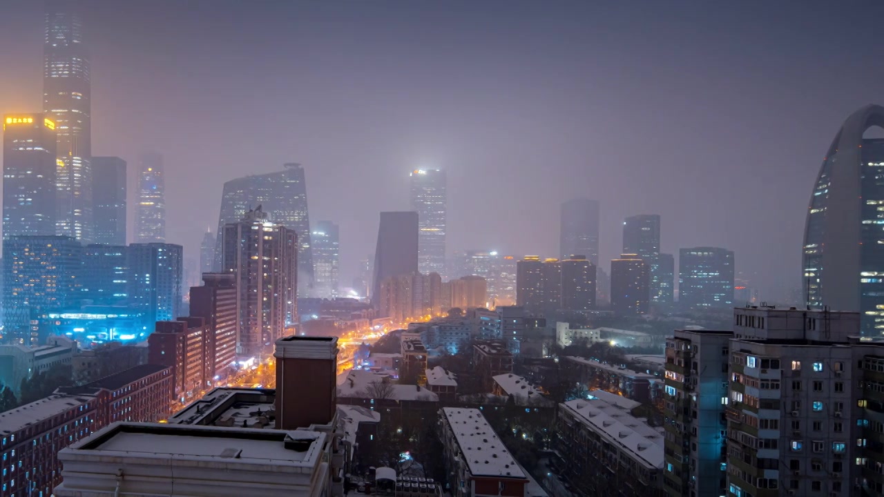 鸟瞰北京国贸CBD雪景夜晚视频素材