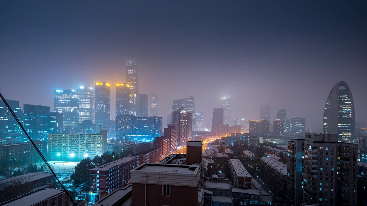 鸟瞰北京国贸CBD雪景夜晚视频素材