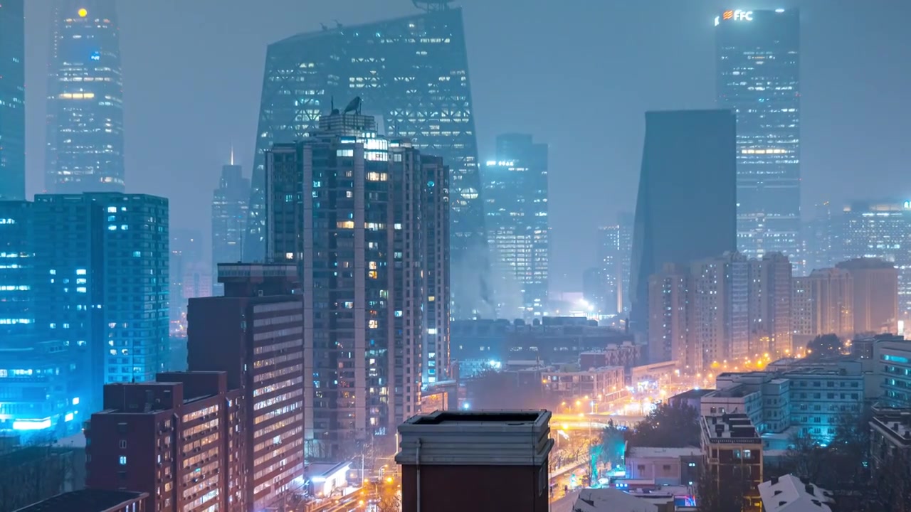 鸟瞰北京国贸CBD雪景夜晚视频素材