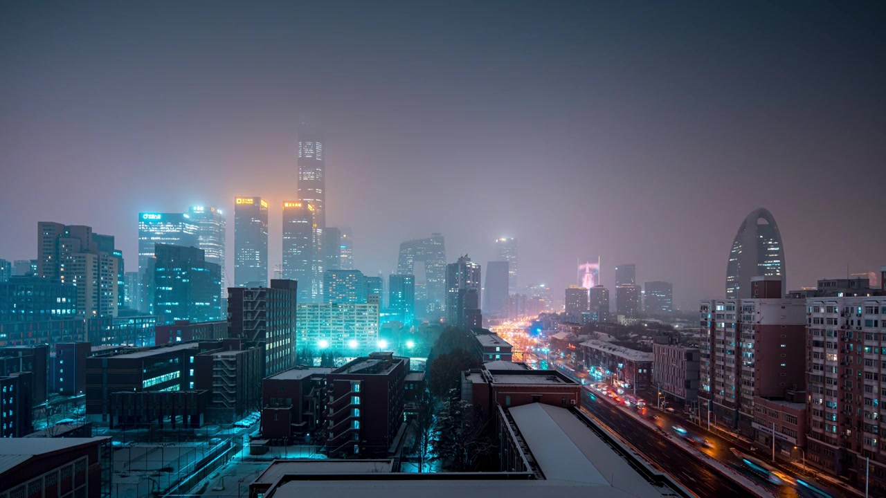 鸟瞰北京国贸CBD雪景夜晚视频素材