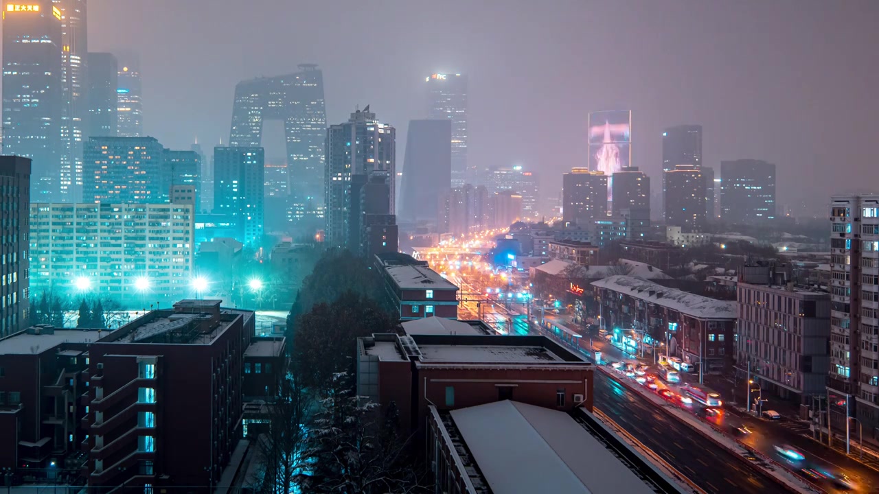 鸟瞰北京国贸CBD雪景夜晚视频素材