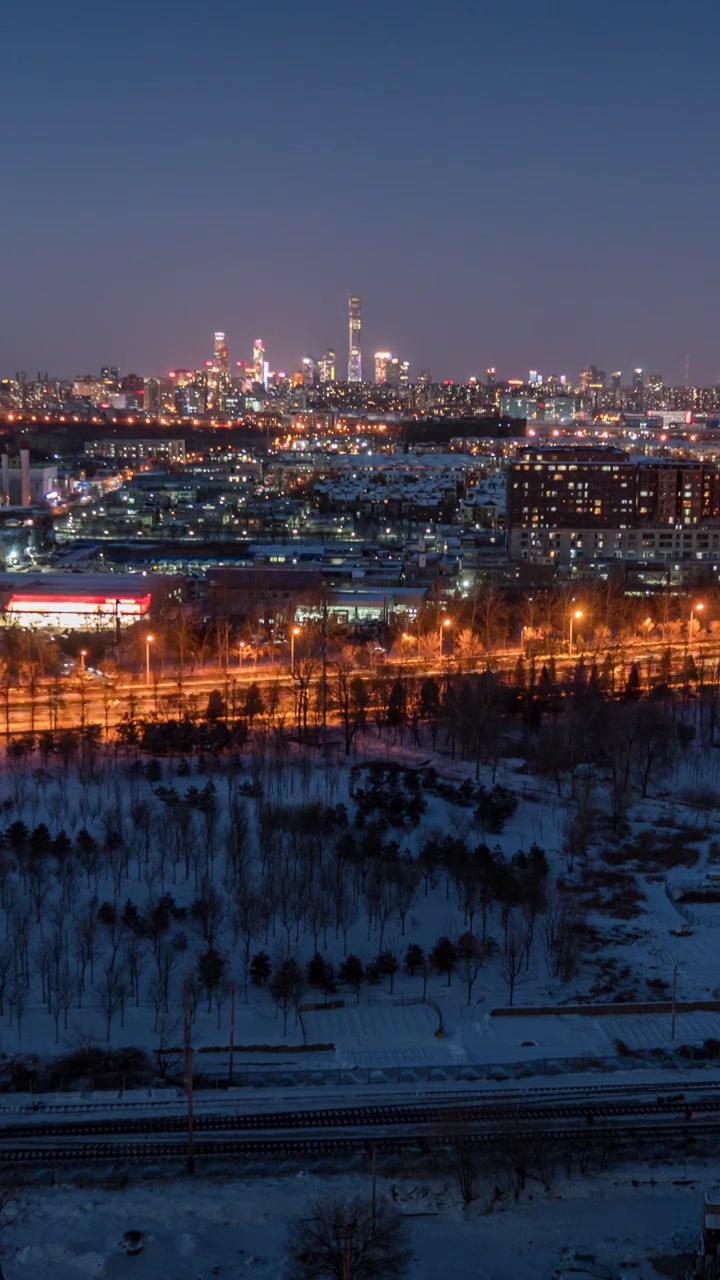 北京国贸CBD雪后夜景延时摄影视频素材