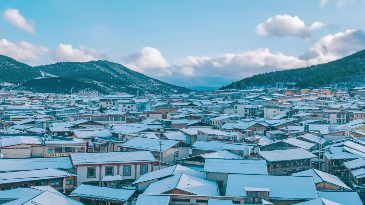 云南香格里拉独克宗古城雪后延时摄影视频下载