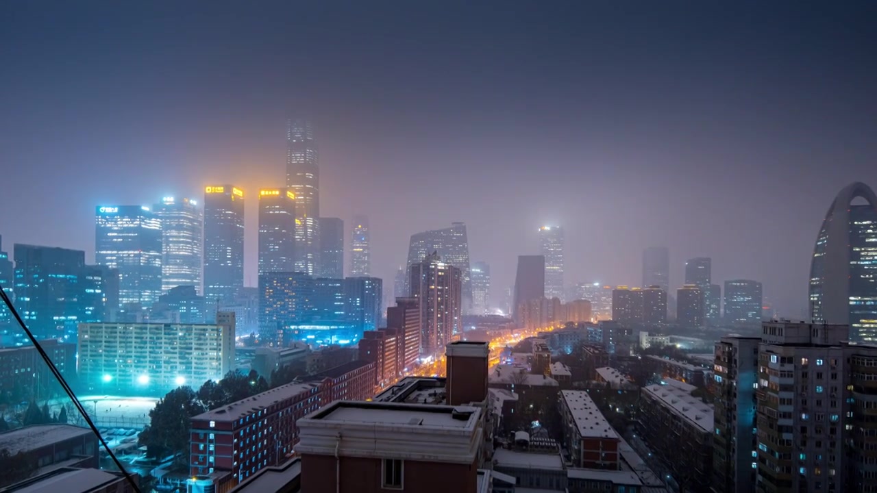 鸟瞰北京国贸CBD雪景夜晚视频素材