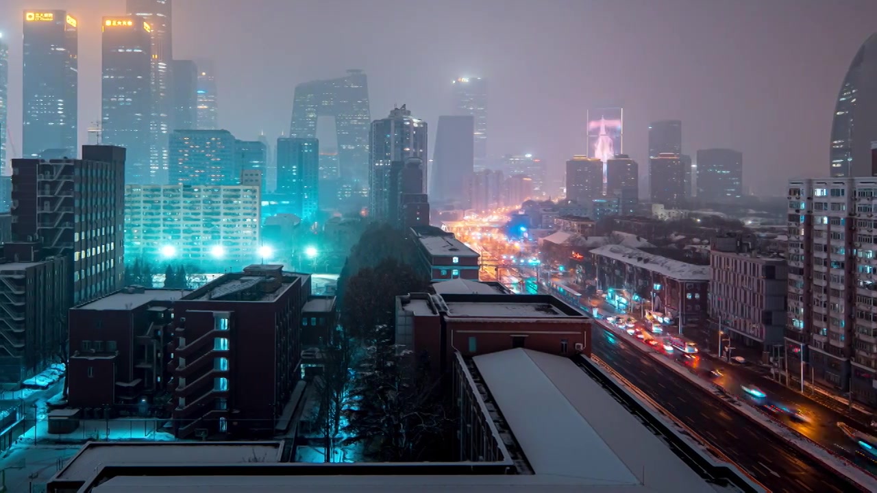 鸟瞰北京国贸CBD雪景夜晚视频素材