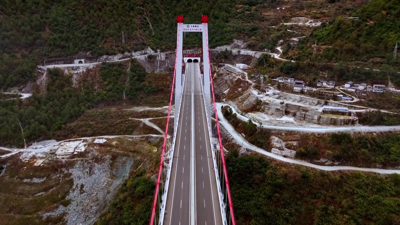 航拍虎跳峡金沙江特大桥日出光影视频素材