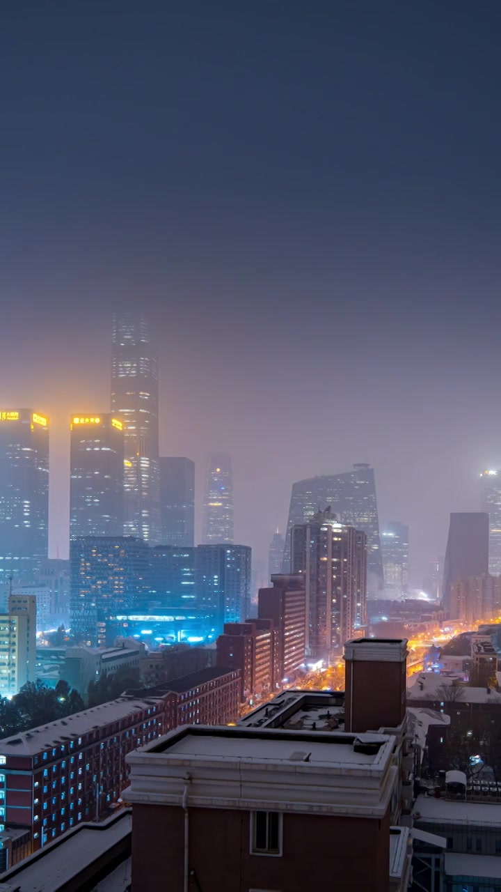 鸟瞰北京国贸CBD雪景夜晚视频素材