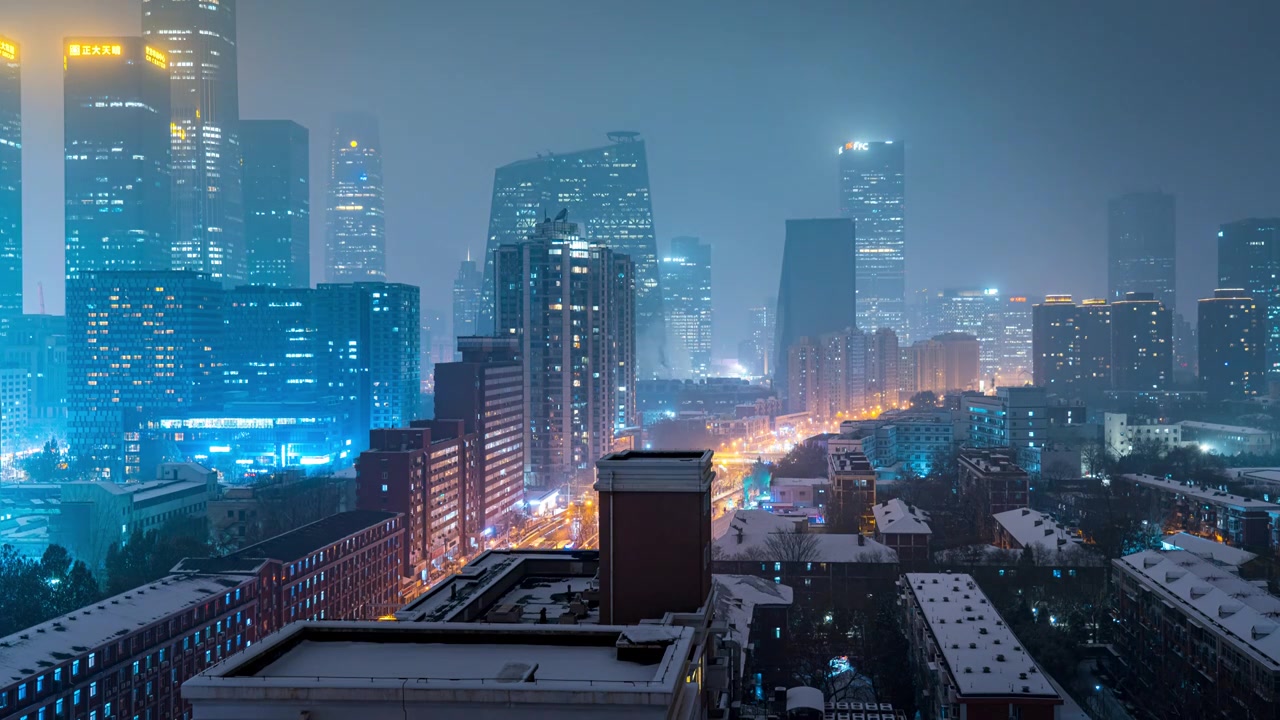 鸟瞰北京国贸CBD雪景夜晚视频素材