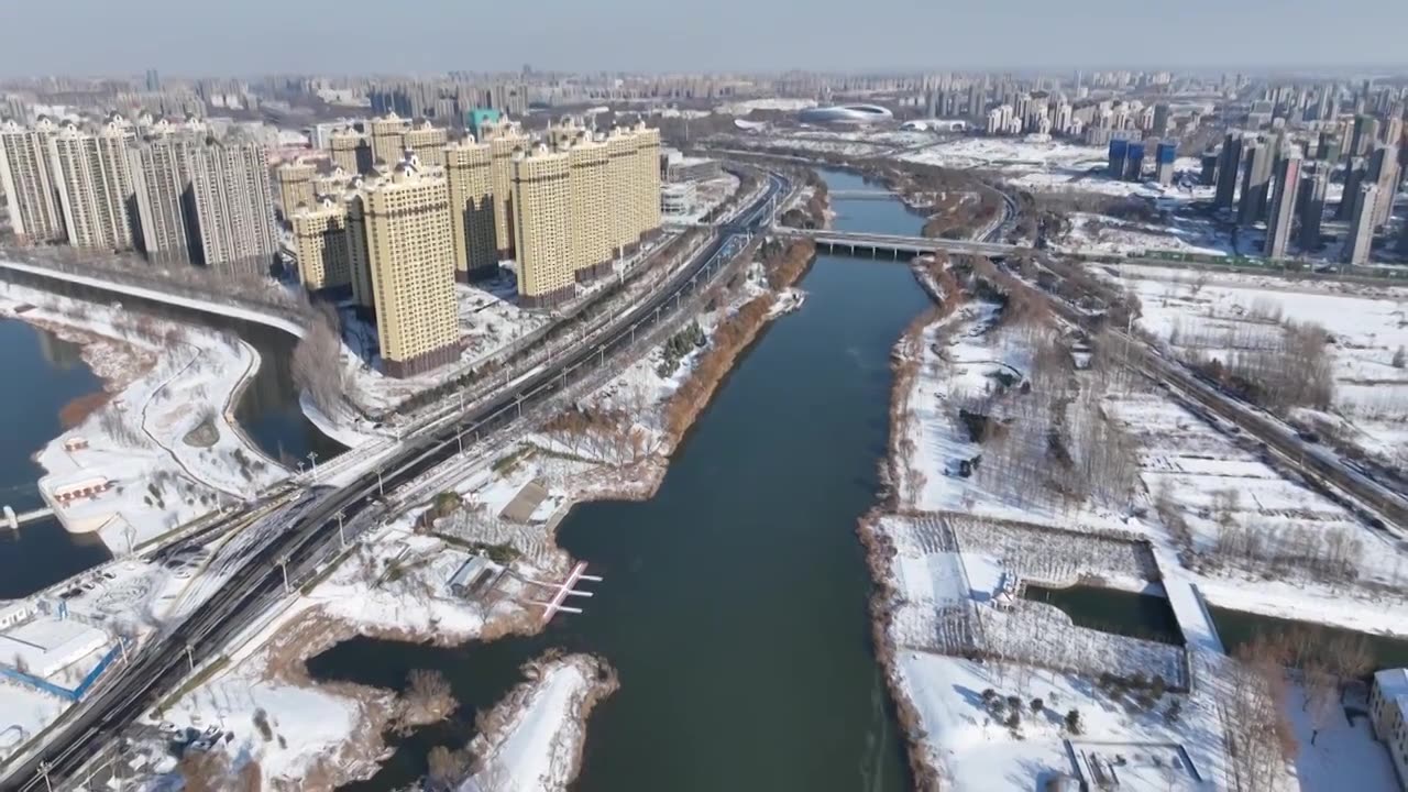 雪后的徒骇河与京杭运河交汇处+山东省聊城市东昌府区四河头水利遗址公园视频下载