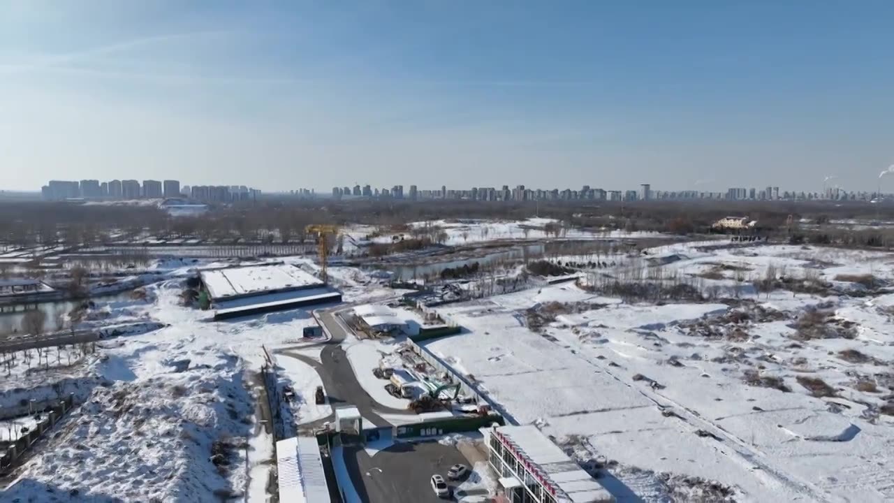 雪后的徒骇河与京杭运河交汇处+山东省聊城市东昌府区四河头水利遗址公园视频素材