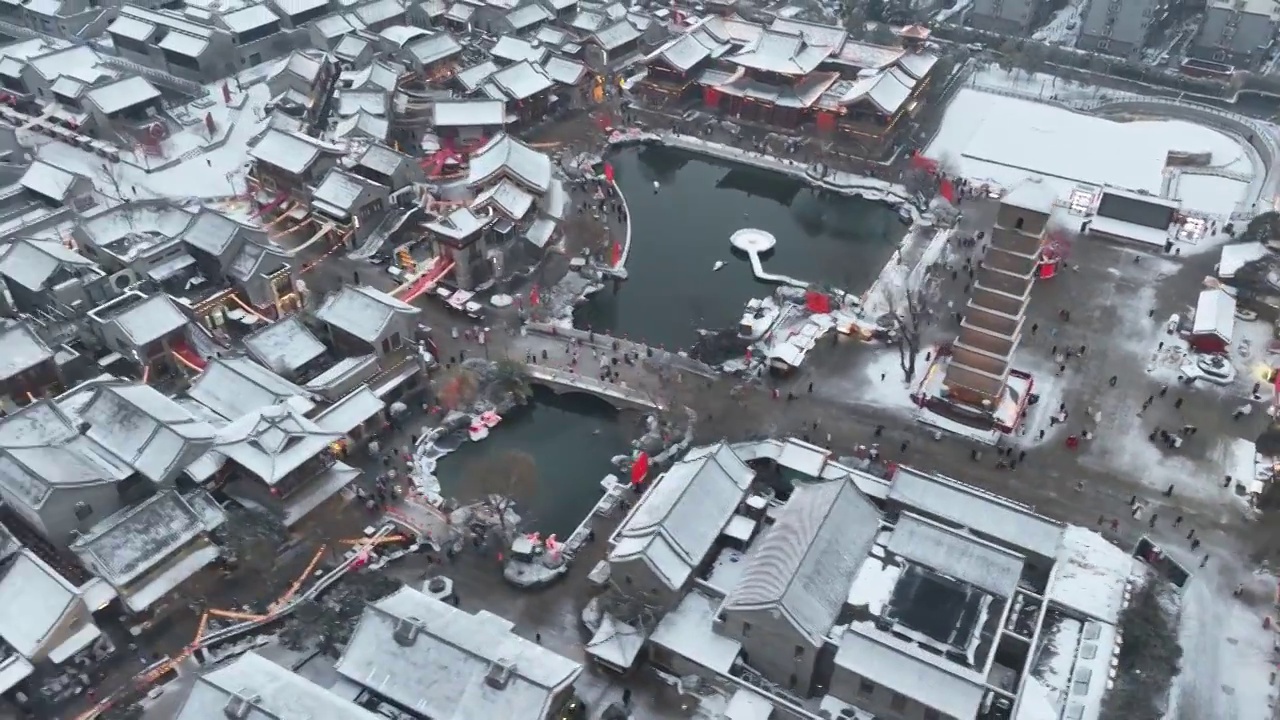 雪后洛阳洛邑古城航拍视频素材