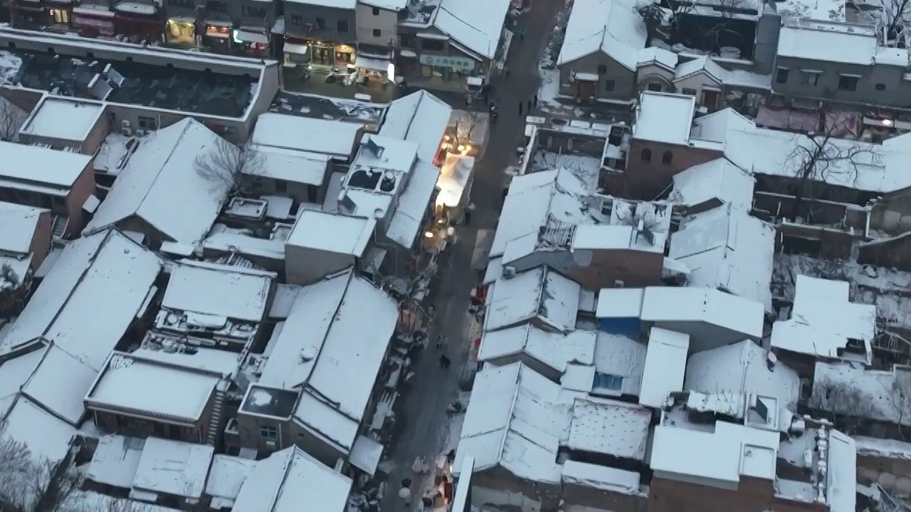 雪后洛阳洛邑古城航拍视频素材