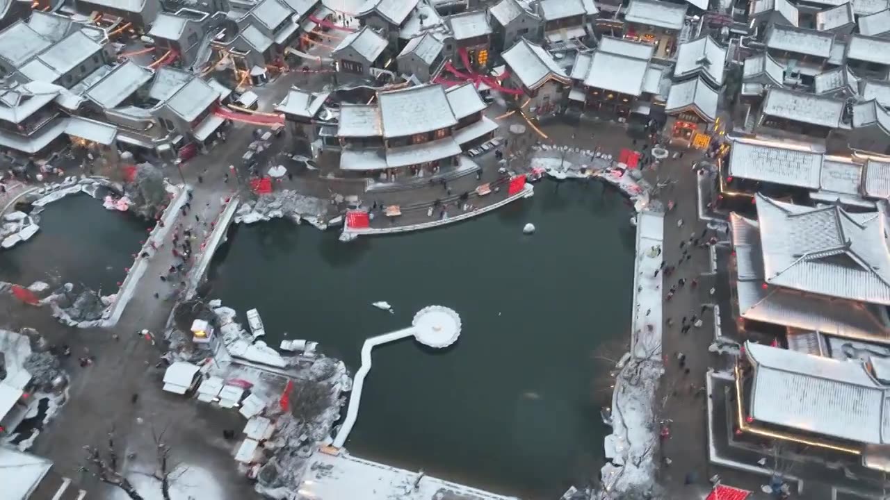 雪后洛阳洛邑古城航拍视频素材