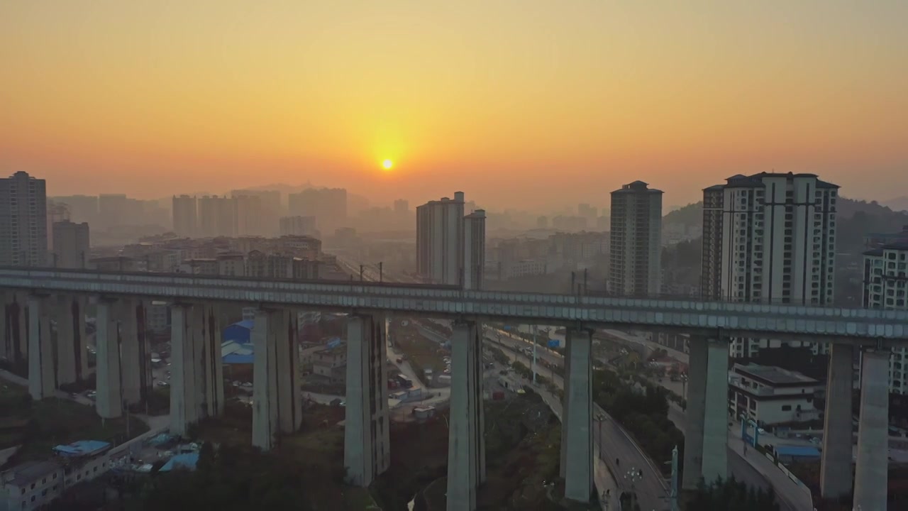 城市高铁动车火车桥梁日落航拍视频素材