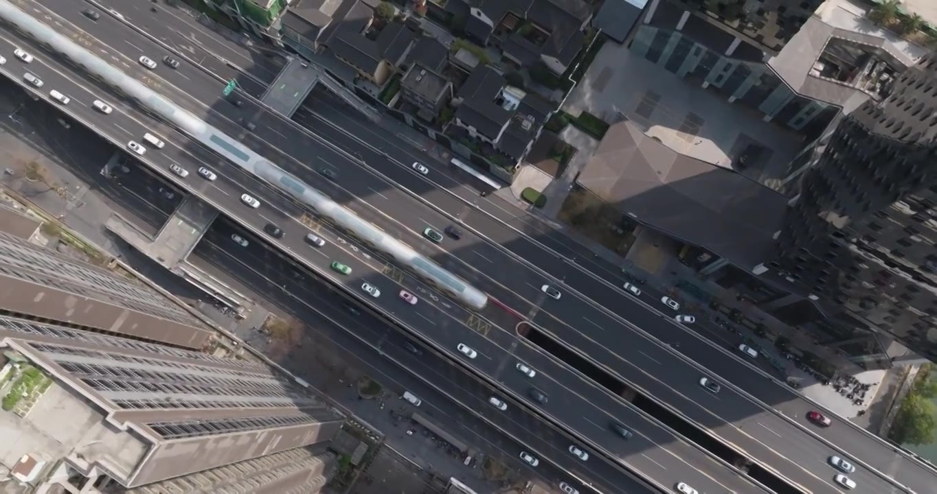 高角度航拍城市高楼下的道路车流成都二环路视频素材