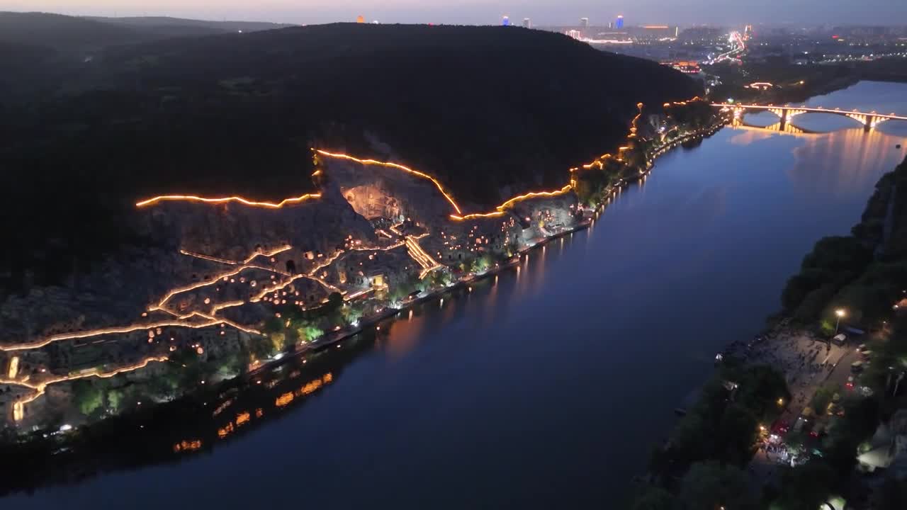 洛阳龙门石窟夜景航拍合集视频素材