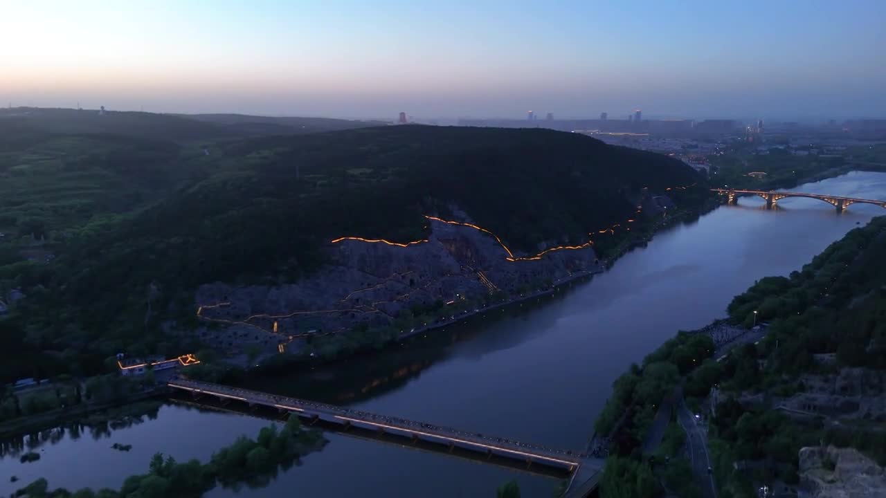 洛阳龙门石窟夜景航拍合集视频素材