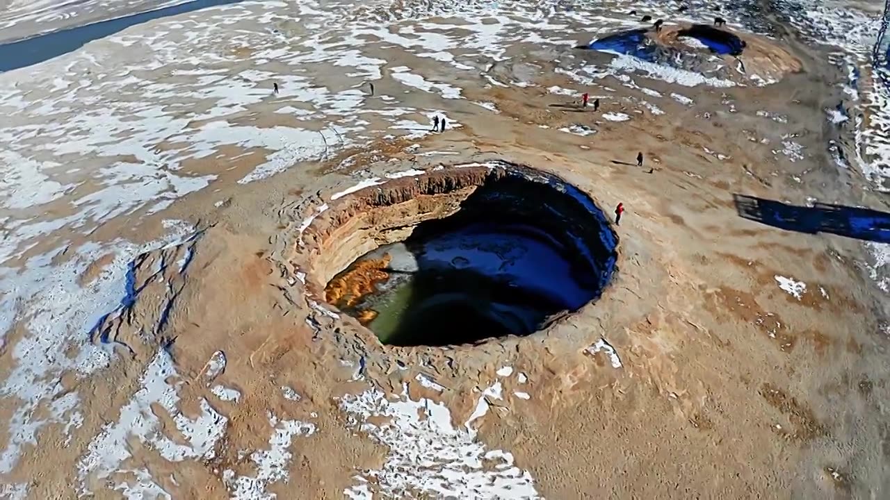 航拍冬季雪后中国新疆克州阿克陶木吉火山口视频素材