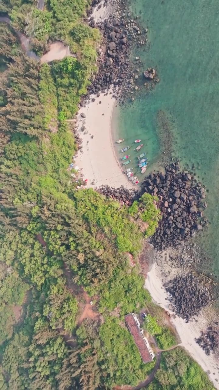 航拍海南儋州峨蔓火山海岸白昼风光视频素材