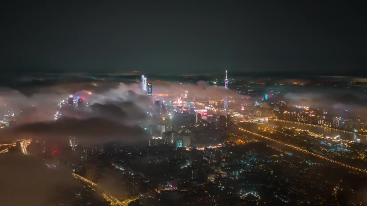 夜晚航拍延时云雾缭绕的广州珠江新城CBD视频素材