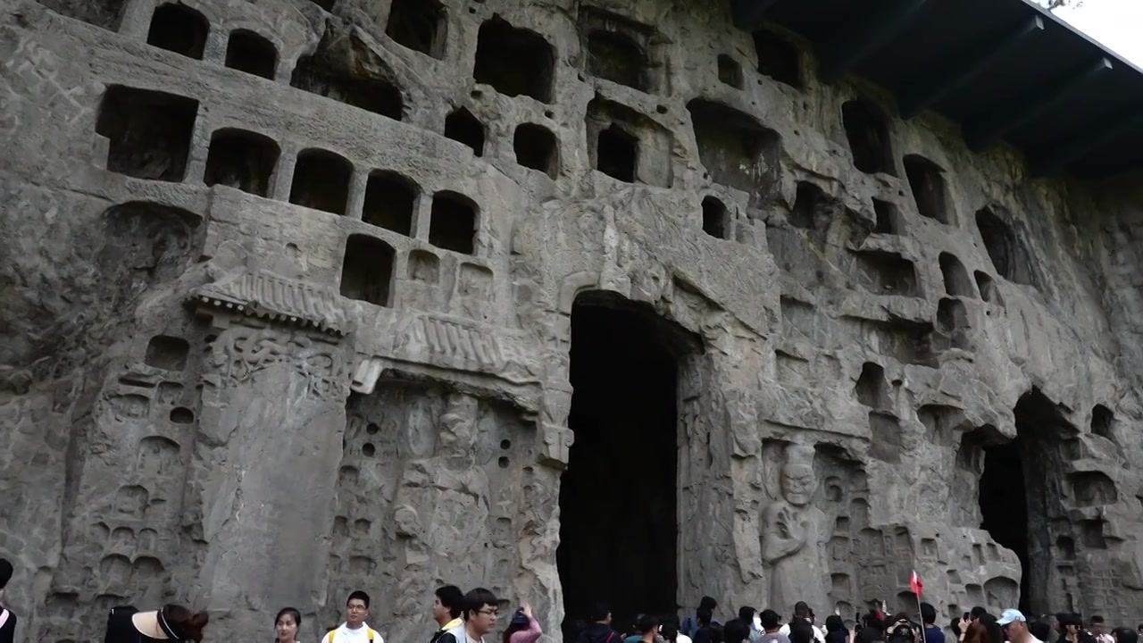 洛阳旅游龙门石窟佛像雕刻视频素材