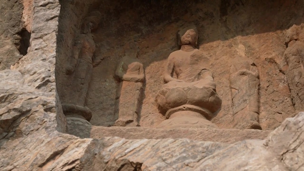 洛阳旅游龙门石窟佛像雕刻视频素材