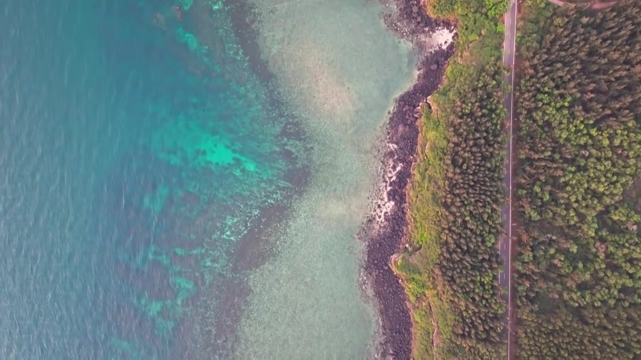 航拍海南儋州峨蔓火山海岸白昼风光视频素材