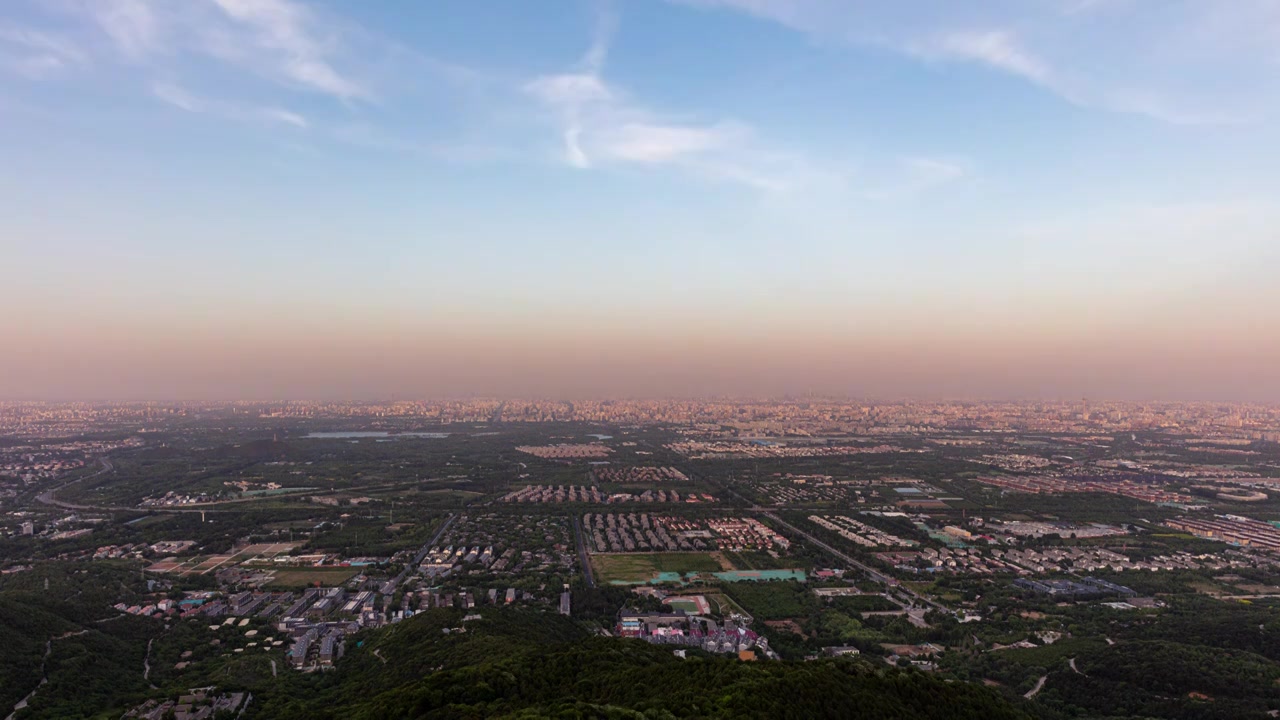 北京西山鬼笑石俯瞰北京城市全景灯光日转夜延时摄影视频下载