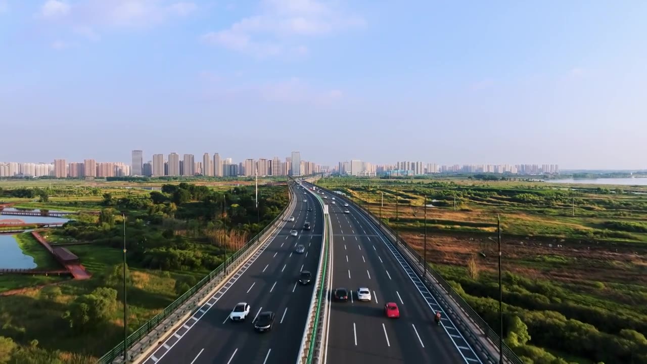 4K60P哈尔滨阳明滩大桥松花江城市航拍视频素材