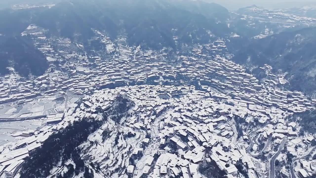 贵州西江千户苗寨雪天航拍视频素材