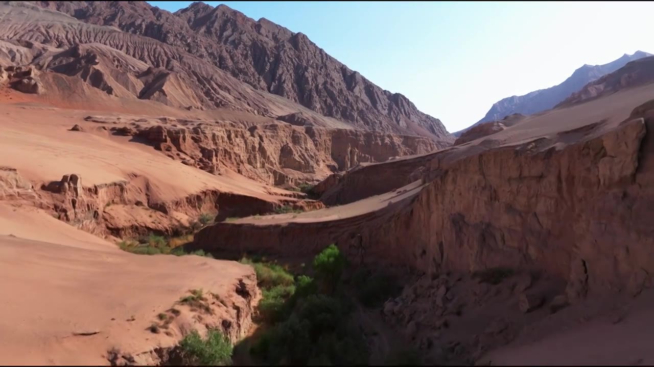 新疆吐鲁番火焰山 山脉悬崖河道航拍视频素材