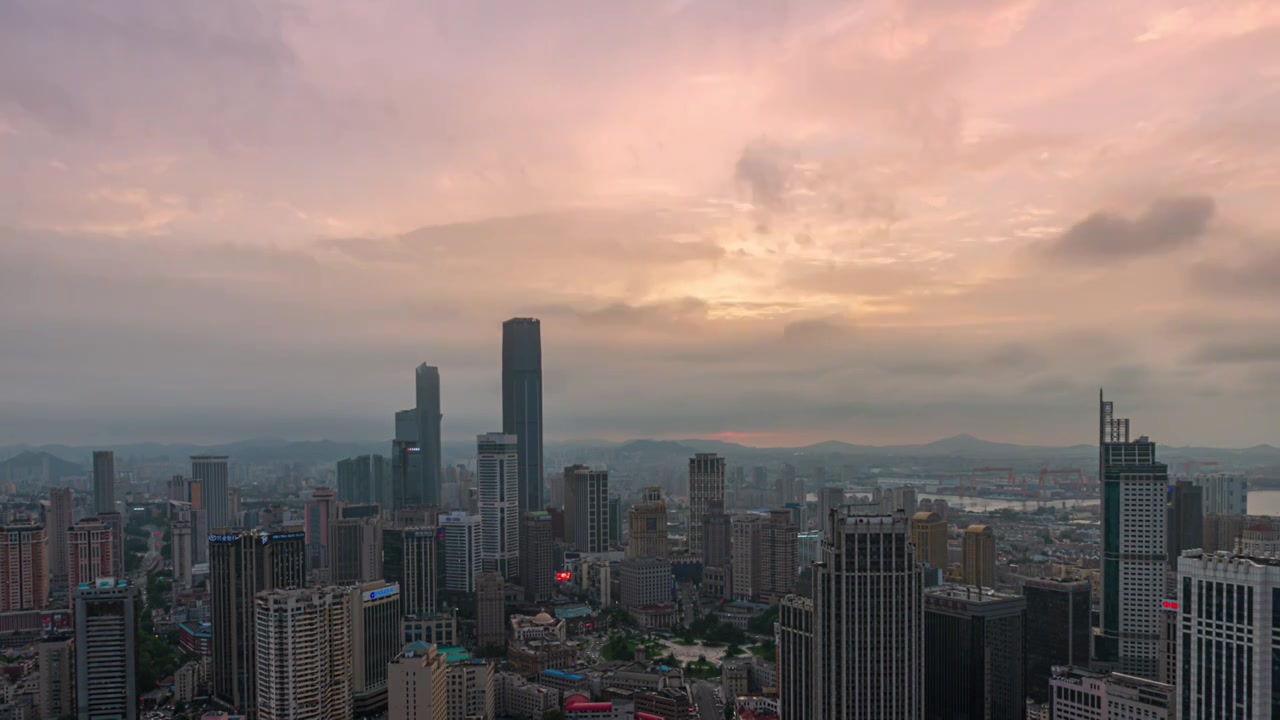 大连市繁华商业中山区CBD晚霞夕阳夜景视频素材