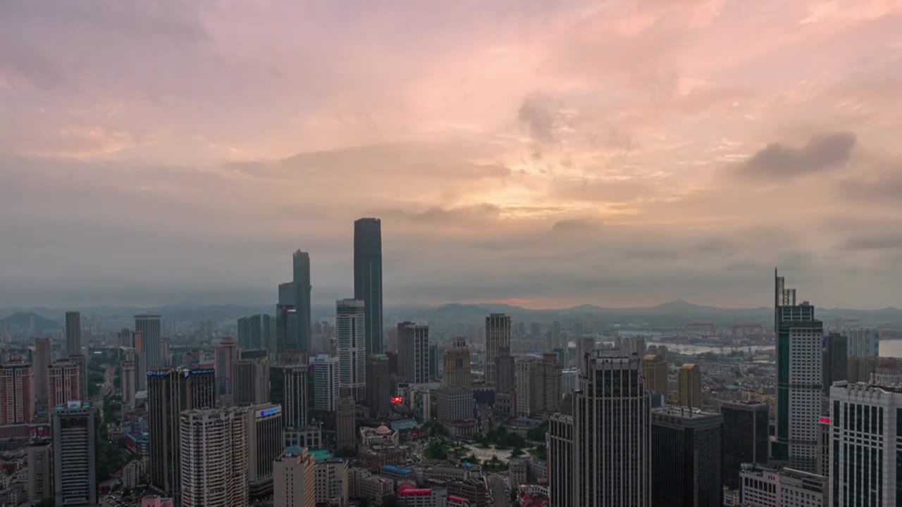 大连市繁华商业中山区CBD晚霞夕阳夜景视频素材