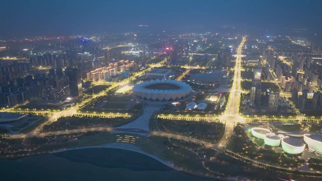 航拍西安奥体中心灞河夜景延时视频素材