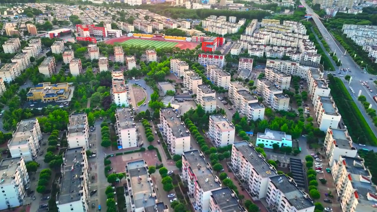 中国辽宁省葫芦岛市龙港区城区傍晚航拍视频下载