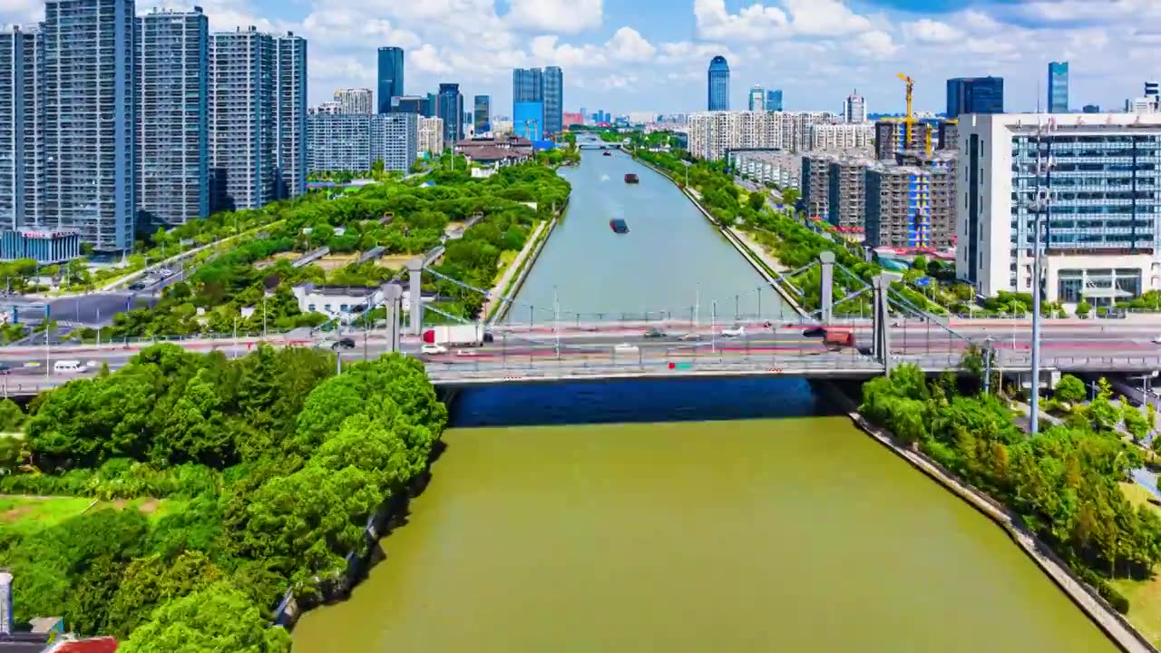 苏州大运河风光带蓝天白云城市风光航拍移动延时视频视频素材