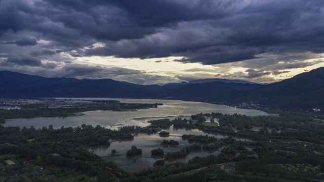 西昌烟雨鹭州湿地公园空中延时航拍视频素材