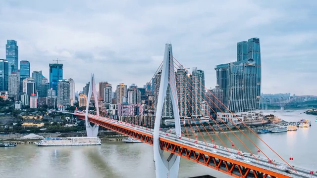 中国重庆市高楼和东水门大桥城市高视角日转夜延时摄影视频素材