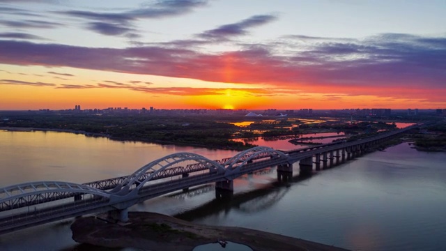 夏日松花江铁路桥夕阳延时视频素材