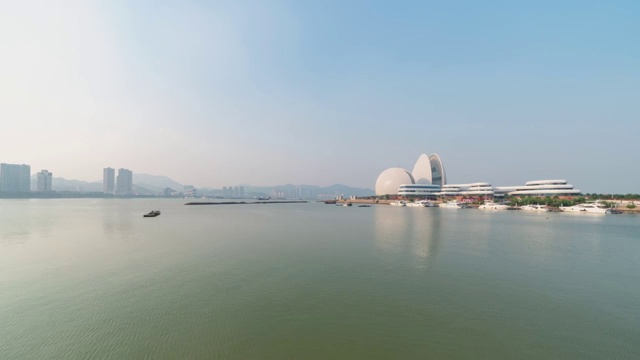 晴朗天气下的的珠海大剧院4K延时摄影视频素材