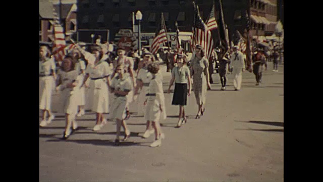 1938年家庭电影- 7月4日阅兵/军人/美国国旗/护士视频素材