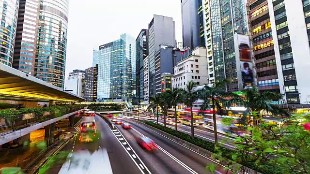 4 k延时。香港交通高峰时间。城市景观的时间从白天到晚上。视频素材