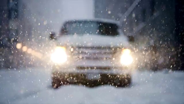 纽约的冬季暴风雪。雪花背景慢动作拍摄视频素材