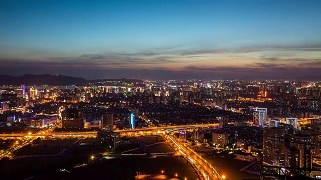 从白天到夜晚的4K延时:照亮杭州夜景，浙江，中国视频素材