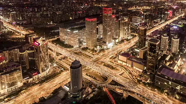 时间推移-鸟瞰图北京路交叉口，从白天到夜晚视频素材