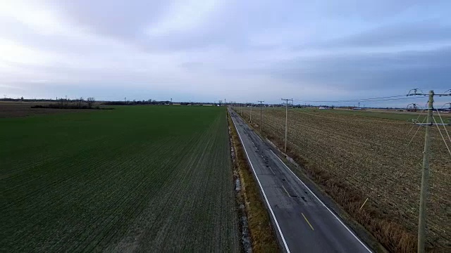 鸟瞰图乡村道路和电力塔视频素材