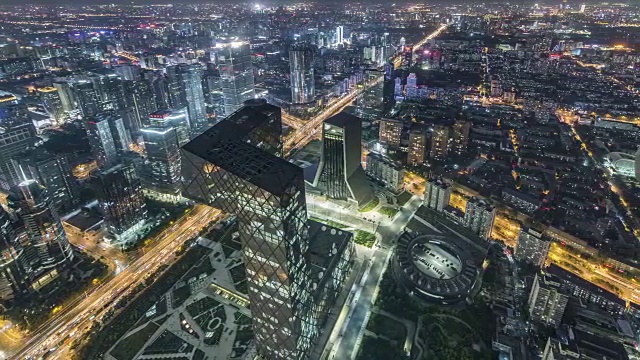 T/L WS HA PAN北京CBD地区夜间鸟瞰图/北京，中国视频素材