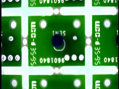 电脑生成图像极端近距离机架聚焦绿色电脑芯片视频素材