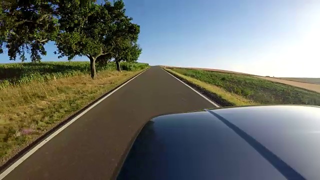 POV，汽车在乡村道路上行驶视频素材